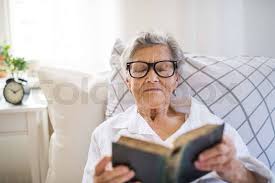 senior lady reading the Bible